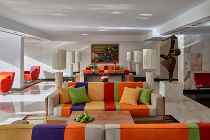 Stay at a luxury beach hotel with interior design inspired by the Seventies